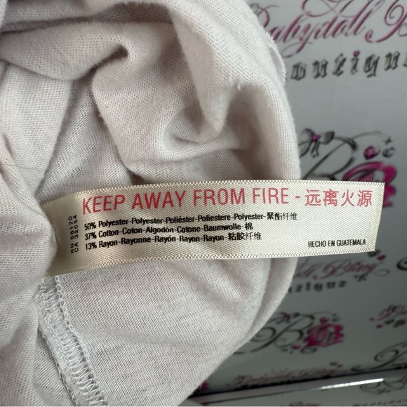 FP Movement Free People White Tank
Multicolor Watercolor Floral Motif shirt - Picture 12 of 15